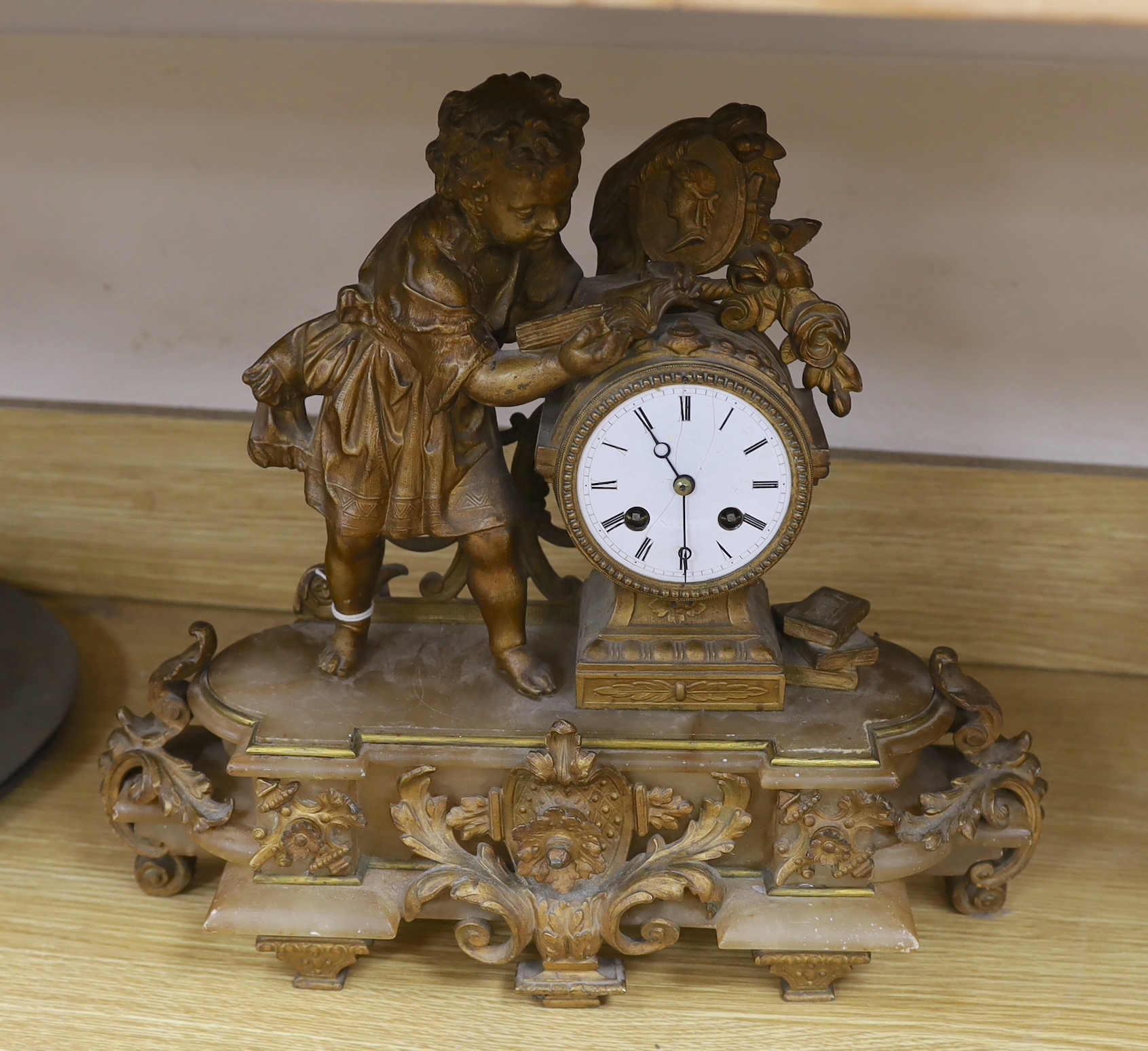 A 19th century French gilt metal mounted figural mantel clock, 38cm